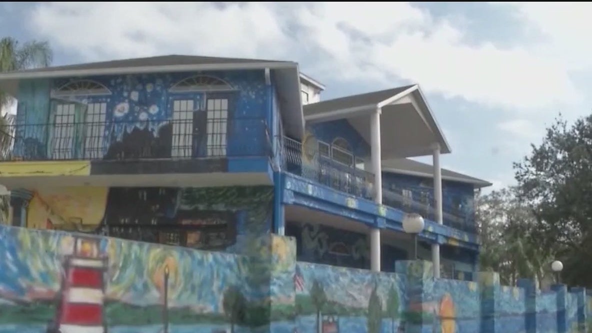 Painters repainting the Starry Night House